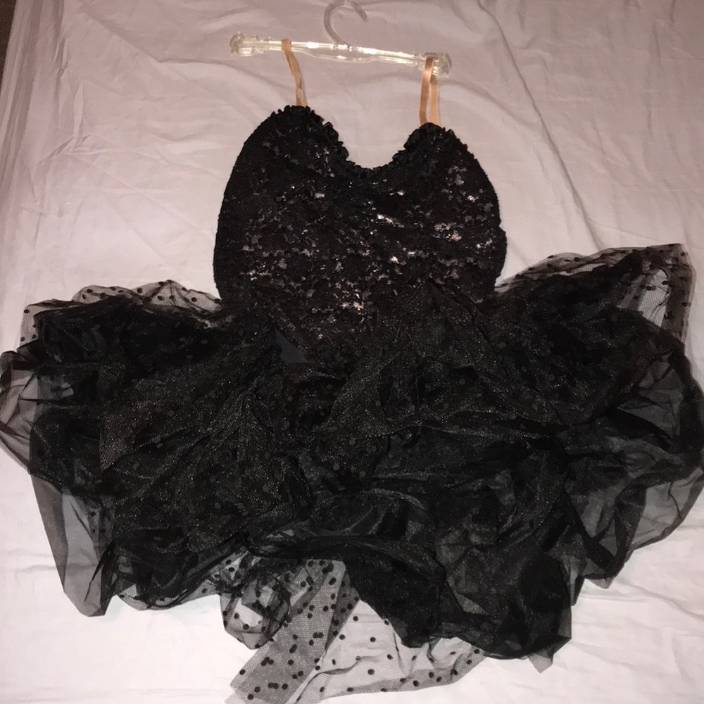 Black poofy leotard with attached belt